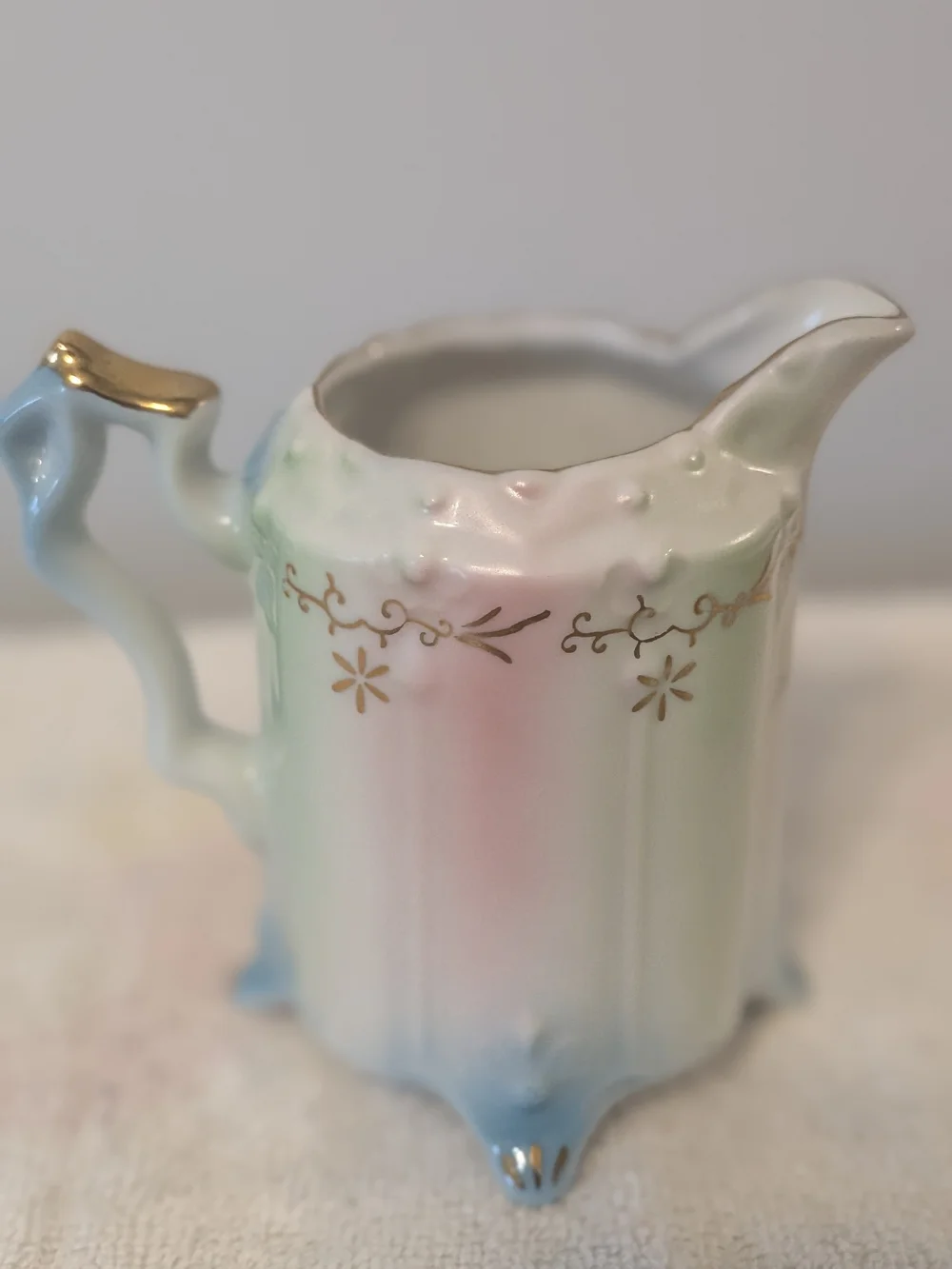 Antique Porcelain Footed Creamer R. S. Prussia Floral Design Trimmed In Gold.